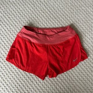 Nike women’s red 3” running shorts with liner